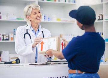 Pharmacist, package and delivery with woman in drug store for medical supplies with courier service. Healthcare professional, female employee and parcel with medicine in pharmacy for ecommerce